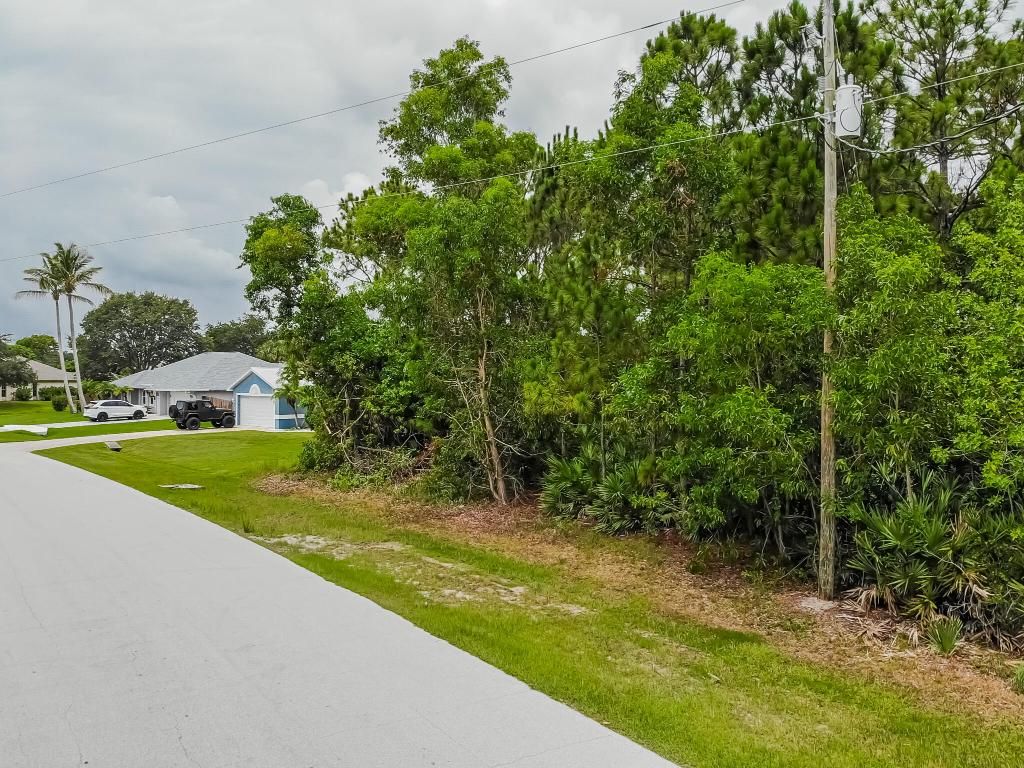 Photo of 2262 SE Rock Springs Drive, Port Saint Lucie, FL 34952 (MLS # R11003684)