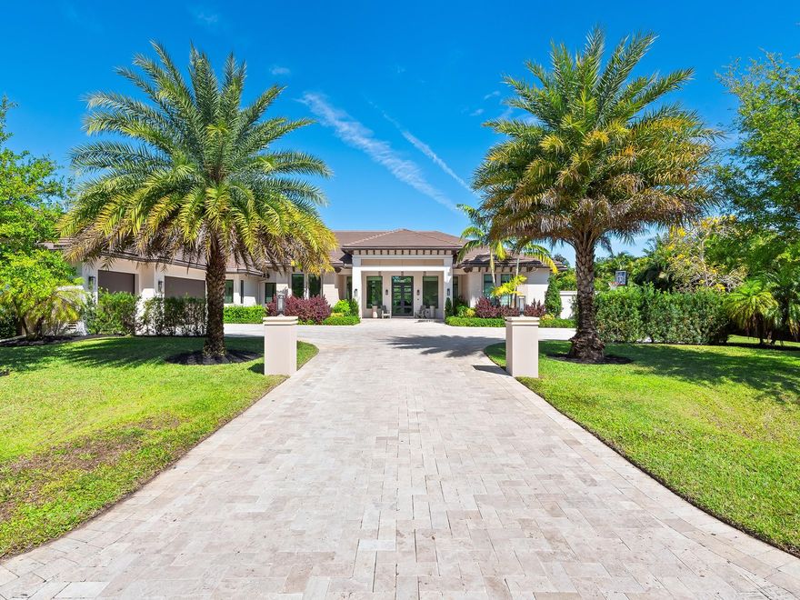 Experience elevated living in this custom 2019-built estate by David Berman, set on a private 1-acre lot in the exclusive gated community of Oak Hollow Estates, w/only 13 estate homes. This 4 bed, 4.5 bath + office single-story home offers 16' ceilings,impact windows, designer lighting, & custom built-ins. All bedrooms are ensuite, including the spacious primary suite w/a spa-like bath, private garden atrium, coffee bar, & custom closets. The chef’s kitchen boasts Viking appliances, an oversized island, wetbar, wine cooler, & walk-in pantry. Outdoors, enjoy a saltwater pool & spa, summer kitchen, outdoor shower, & lush landscaping w/fruit trees. Steps from nature trails, and top-rated schools, this home is complete with a full-home generator, 3-car Gar w/EV chargers, & smart home features.
