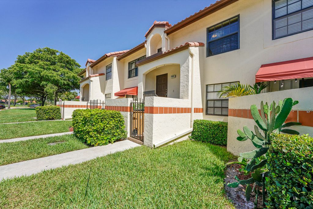 Photo of 704 Freedom Court, Deerfield Beach, FL 33442 (MLS # B26005585)