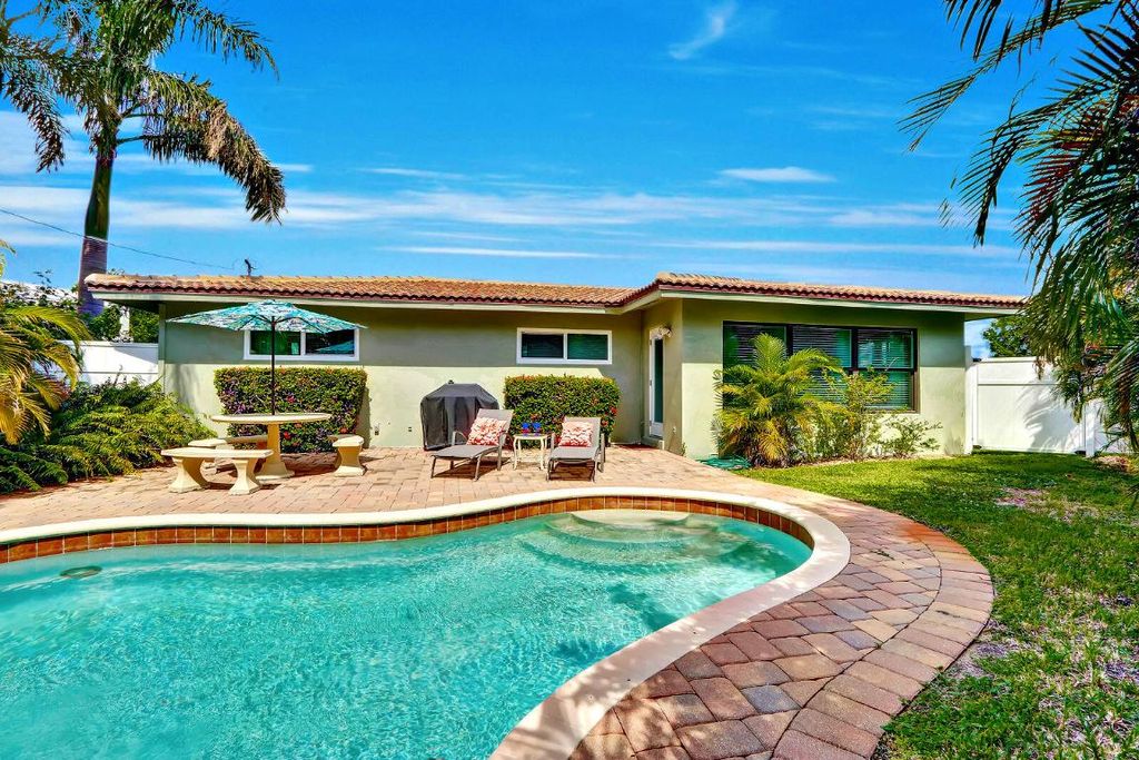 Photo of 390 N Juno Lane, Juno Beach, FL 33408 (MLS # R10996706)