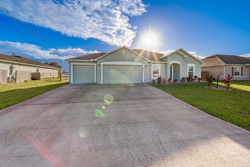 Photo of 4631 SW Athena Drive, Port Saint Lucie, FL 34953 (MLS # R10891403)