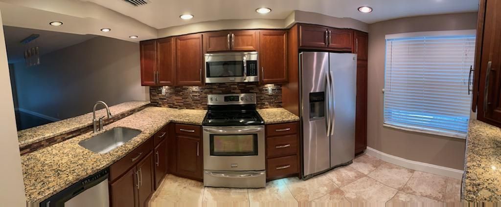 Photo of 2001 Sabal Ridge Court #C, Palm Beach Gardens, FL 33418 (MLS # R10906079)