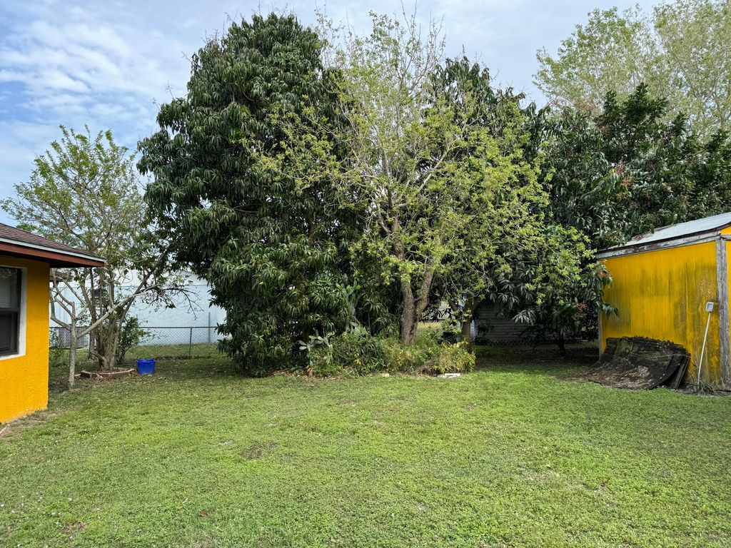 Photo of 450 SW Violet Avenue, Port Saint Lucie, FL 34983 (MLS # R10966388)