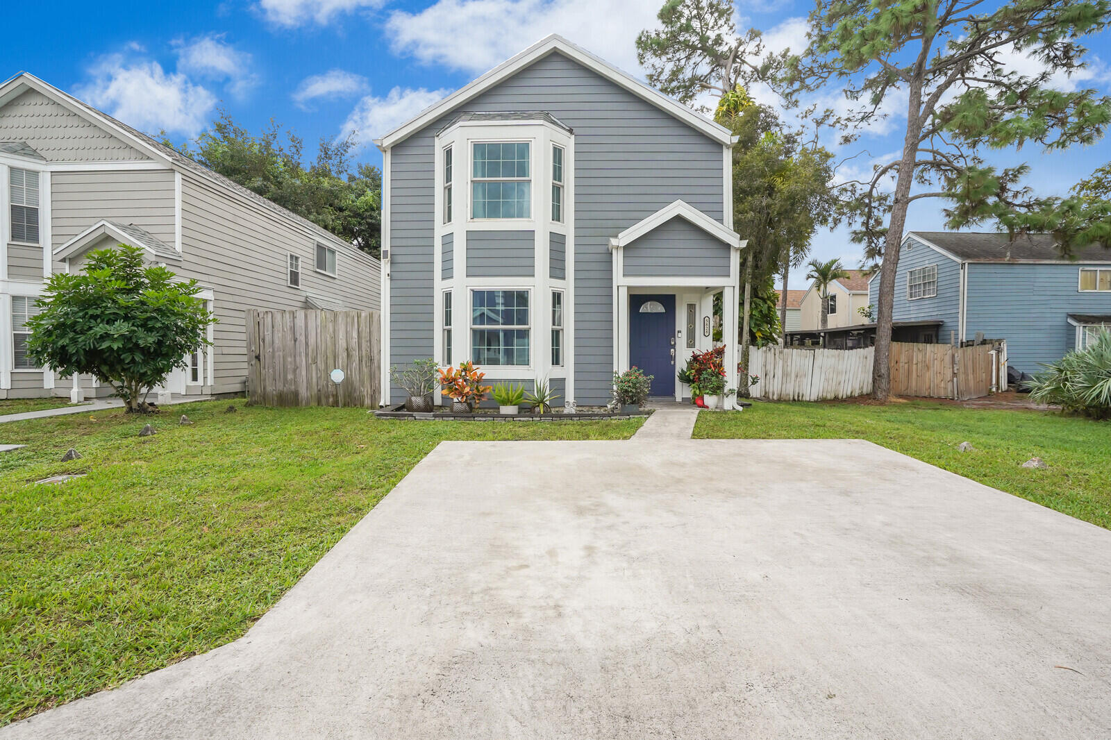 Extensively Renovated in Victoria Woods! This 3BD/2.5BA home features a new roof, full Hardy Plank siding, Cat 5 impact windows and doors, and a new AC--delivering peace of mind for years to come. Inside, enjoy a wide-open layout with a chef-style granite kitchen, shaker cabinets, and stainless appliances. The large master bedroom offers space and comfort, complemented by spa-style baths, updated flooring, and an oversized screened patio with a fenced yard. Gated community with pool, tennis, pickleball, playground, trails & more. Low HOA, no rental restrictions!