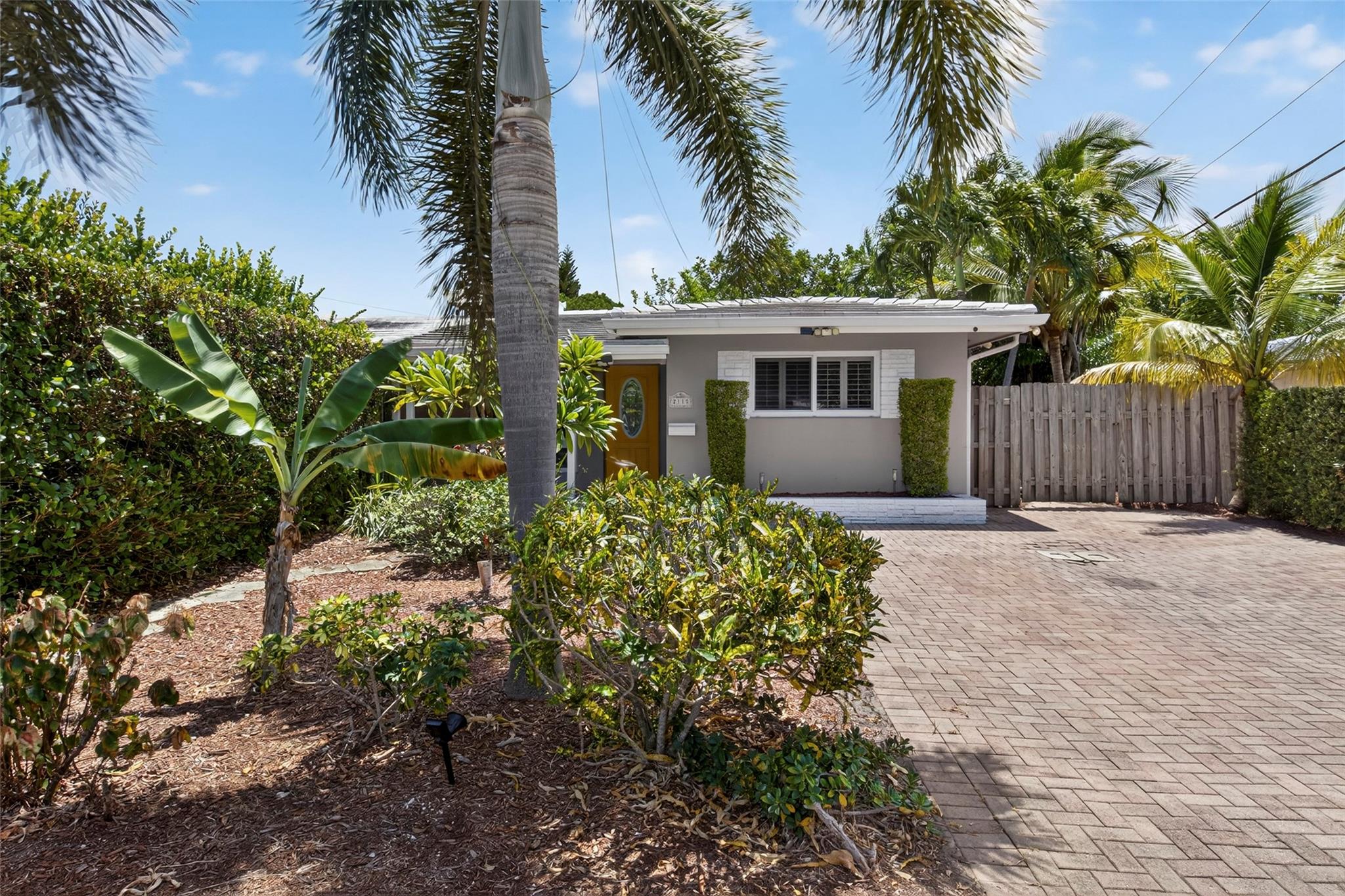East Wilton Manors 2 bedroom, 2 bathroom Villa. Perfect Starter Home Properly Priced! Impact Windows and Doors, 2013 Roof, 2021 A/C, Water Heater, Appliances and Tile Flooring in main living areas. Spacious living area, Open Kitchen with bar seating, Quartz counter-tops and wood cabinets. Two Master Suites with Updated Baths and Plantation Shutters. Covered Front Entry, large Screened-In Patio, Laundry/Utility Room, and Privately Fenced Landscaped Garden Area, Spacious paver driveway accommodating 2 cars comfortably. Updated Electrical Wiring and Panel Box. Central Location A Short Distance to Wilton Drive, the Beach, Downtown Fort Lauderdale, Shopping, the Airport and More!