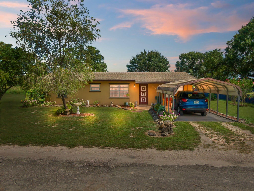 Photo of 3324 S Jenkins Road, Fort Pierce, FL 34981 (MLS # B26068116)