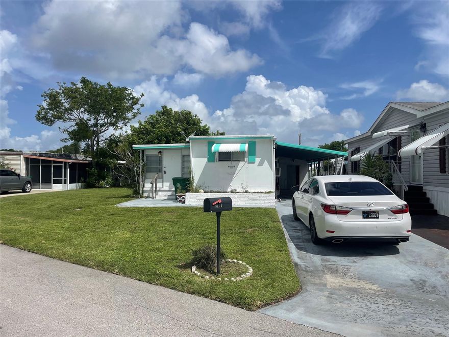 True handyman 3/1 and priced right for quick sale - carport - shed - could be a 3 bedroom - -assoc. states it is HOPA verified - decent size and nice lot size - -