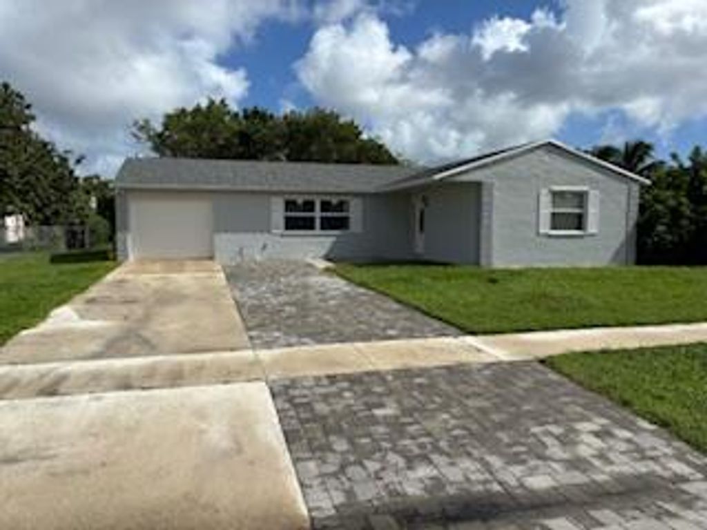 Photo of 4422 Ixora Circle, Lake Worth, FL 33461 (MLS # R11030662)
