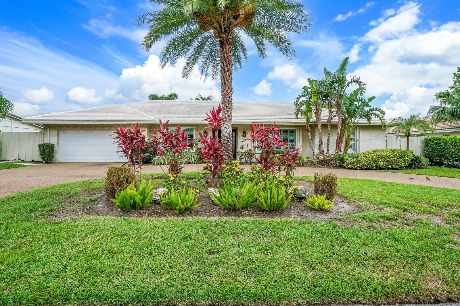 Beautiful 3BR/3.5BA deep water residence tucked away on a quiet cul-de-sac in Lighthouse Point’s exclusive Venetian Isles. Designed for both comfort and style, this home offers a split floor plan, updated kitchen with granite counters and stainless appliances, elegant formal living and dining areas, and a large 2-car garage. Step outside to a sparkling pool and 90ft of concrete dock with boat lift, perfect for avid boaters. Ocean access is just 2 miles via Hillsboro Inlet, with larger vessels able to enjoy smooth passage through the South Grand Canal. Ideally located minutes from dining, shopping, and parks, and only 2.5 miles to Deerfield’s “Blue Wave” beach. Experience the coastal lifestyle where every day feels like a getaway.
