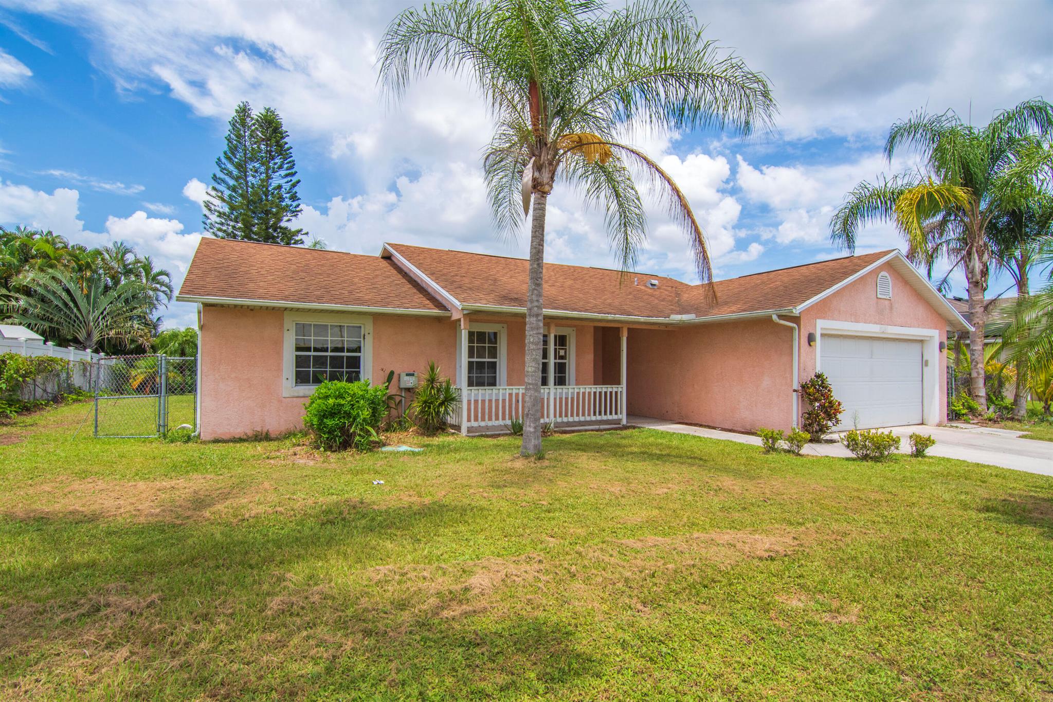 Spacious CBS Pool Home in North St. James Area This solid CBS-built home offers a versatile stacked floor plan and is ready for your personal touch. Located in the desirable North St. James area of Port St. Lucie, the property features vaulted ceilings, city water and sewer, and a screened-in pool within a fully fenced backyard--perfect for relaxing or entertaining. A true blank canvas with great potential to customize and make it your own.Buyer to verify exposure all measurements are approximate