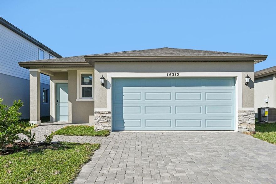 Available now! 60 day closing ready guarantee! Inquire about below market rates and incentives!1,513 sq. ft. with 3 bedrooms, 2 bathrooms, and a bright, open-concept layout. The modern kitchen includes stainless steel appliances and a spacious island, perfect for entertaining. Upgrades include all appliances, window blinds, smart home technology, and quartz countertops! Enjoy a patio and energy-efficient features throughout. Located in Terra Lago, a new community with resort-style amenities including a clubhouse, pool, and walking trails. Conveniently situated near both Martin and Palm Beach County.