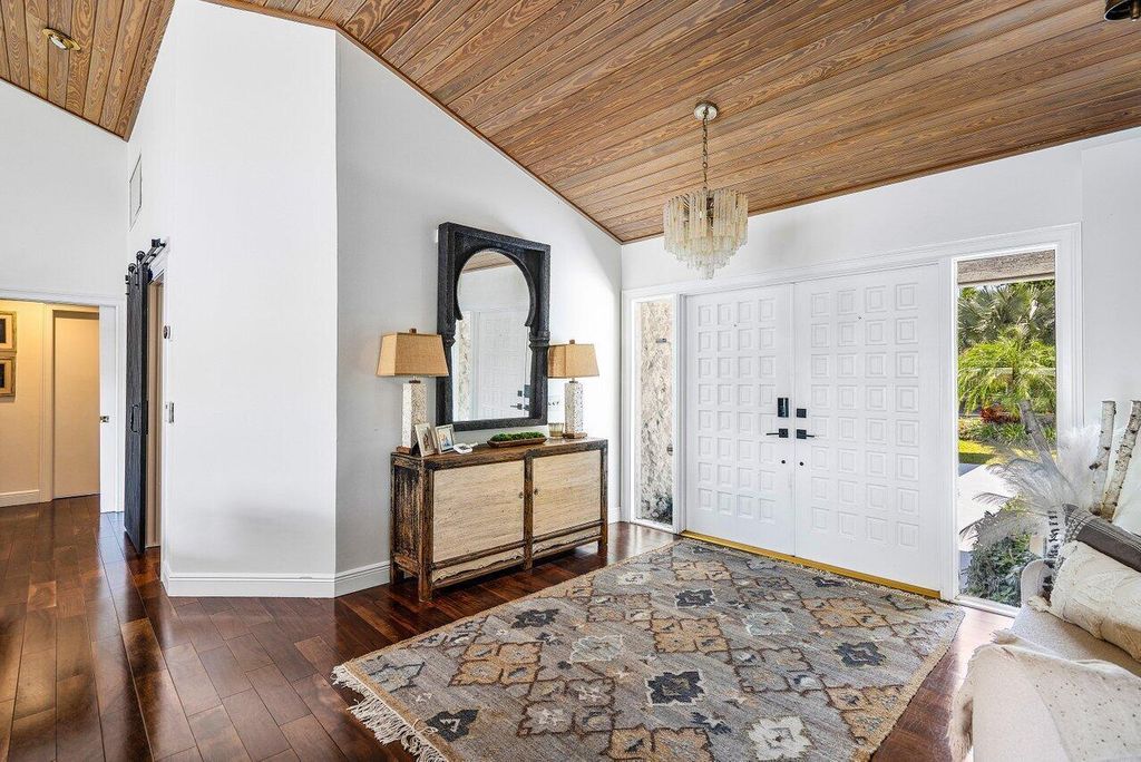 Photo of 66 Dunbar Road, Palm Beach Gardens, FL 33418 (MLS # R11022331)