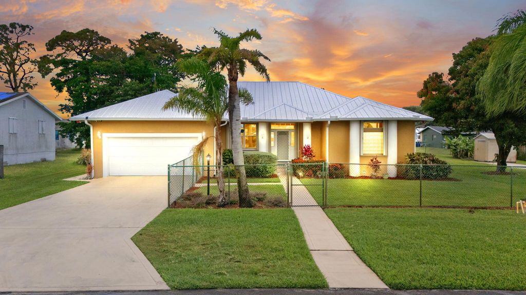 Photo of 5660 SE Colee Avenue, Stuart, FL 34997 (MLS # B26028289)
