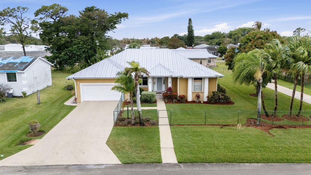 Photo of 5660 SE Colee Avenue, Stuart, FL 34997 (MLS # B26028289)