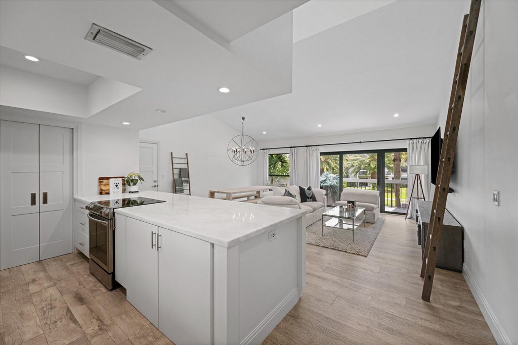 Photo of 11863 Wimbledon Circle #532, Wellington, FL 33414 (MLS # B26034336)