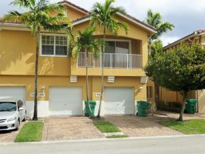 Great 2/2 end unit townhouse with balcony, water view and attached garage. The kitchen has recessed lights and is open to the living dining room. Amenities include a clubhouse, exercise room and pool. Located in a gated community. Move in ready condition. Walking distance from the Club House. Close to the major roads, shopping center, restaurants and the beach. Per HOA all applicants are required to finance no more than 85% of the total sales price. Seller will professionally clean the carpet in the bedrooms & stairs prior to closing.