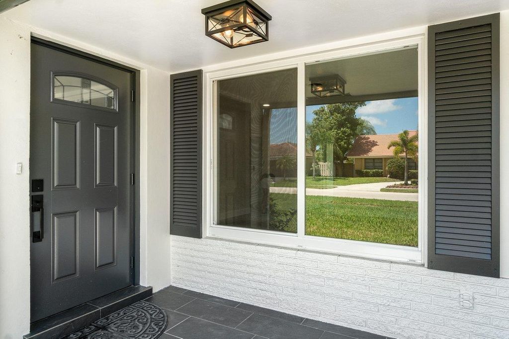 Photo of 928 SW 4th Street, Boca Raton, FL 33486 (MLS # R11066869)