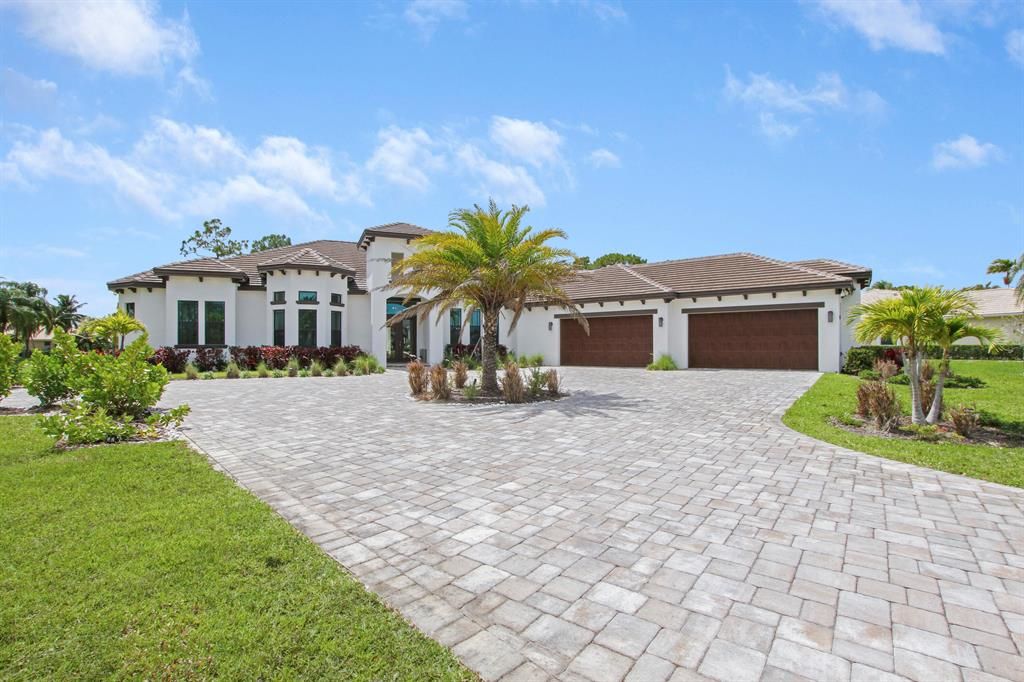 Photo of 7831 E Woodsmuir Drive, Palm Beach Gardens, FL 33412 (MLS # R10711948)