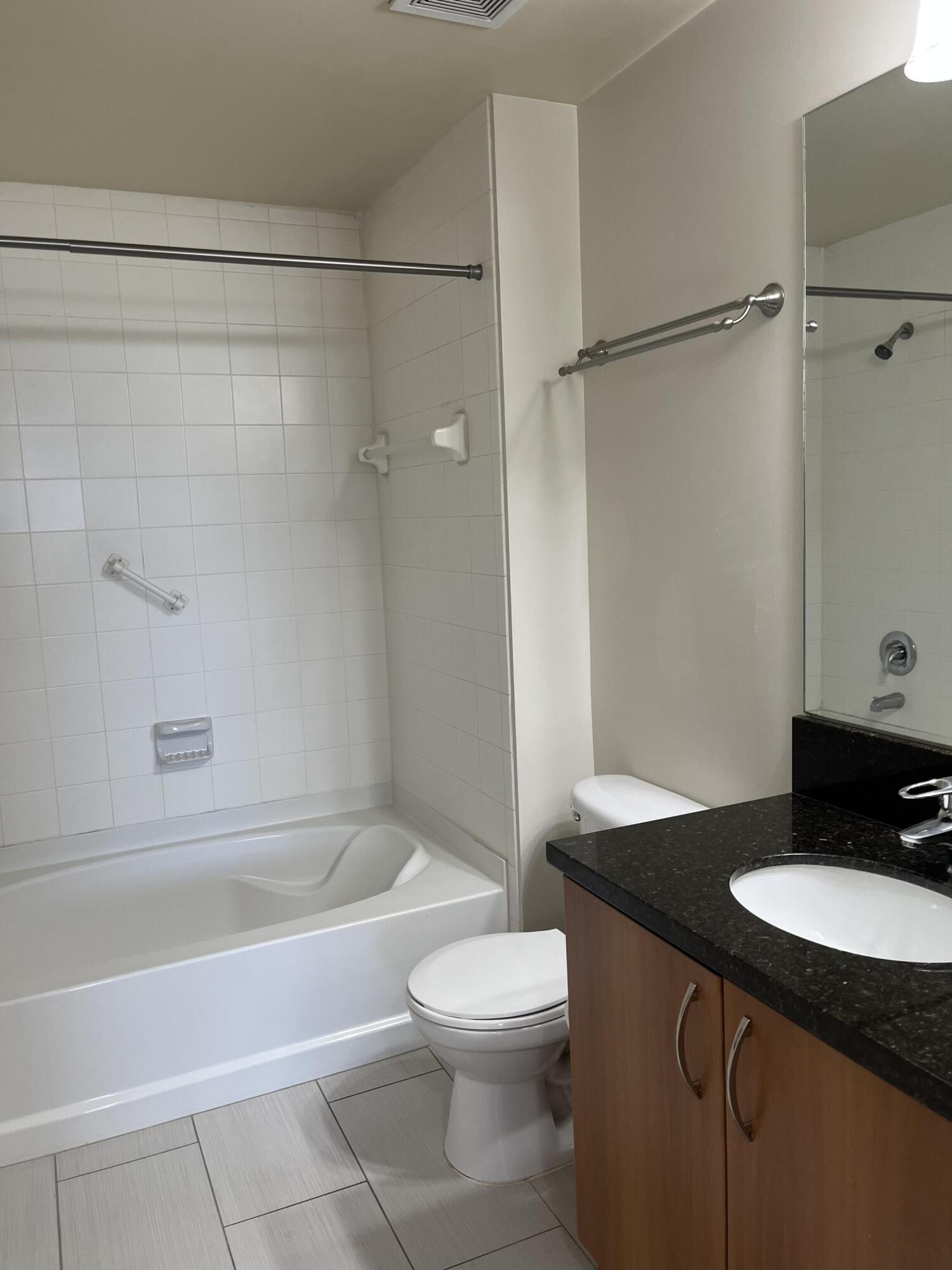 PINEAPPLE GROVE VILLAGE CONDOMINIUM - Residential