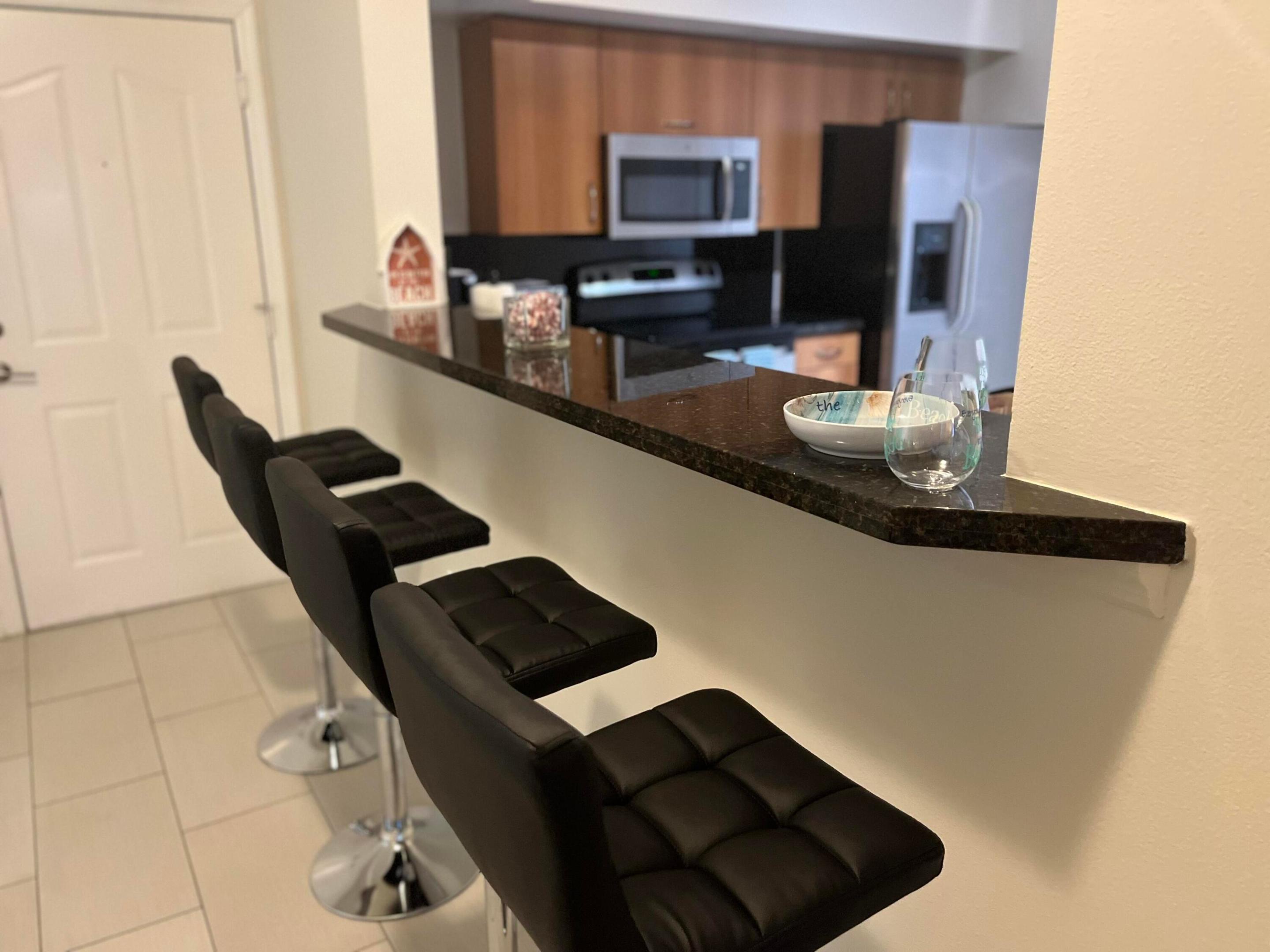 PINEAPPLE GROVE VILLAGE CONDOMINIUM - Residential