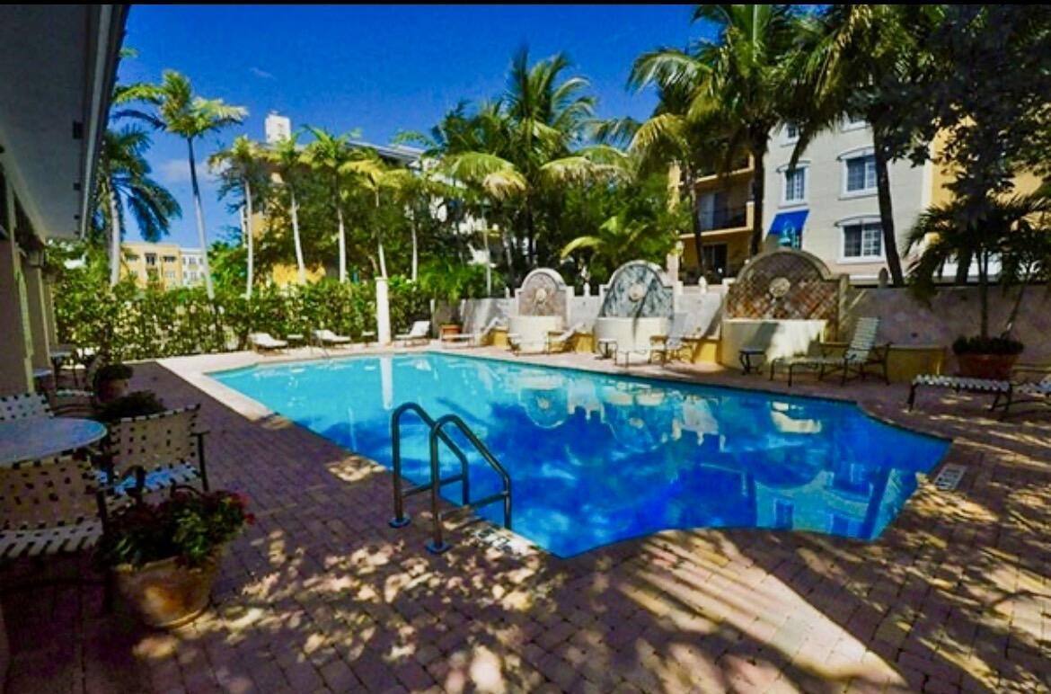 PINEAPPLE GROVE VILLAGE CONDOMINIUM - Residential