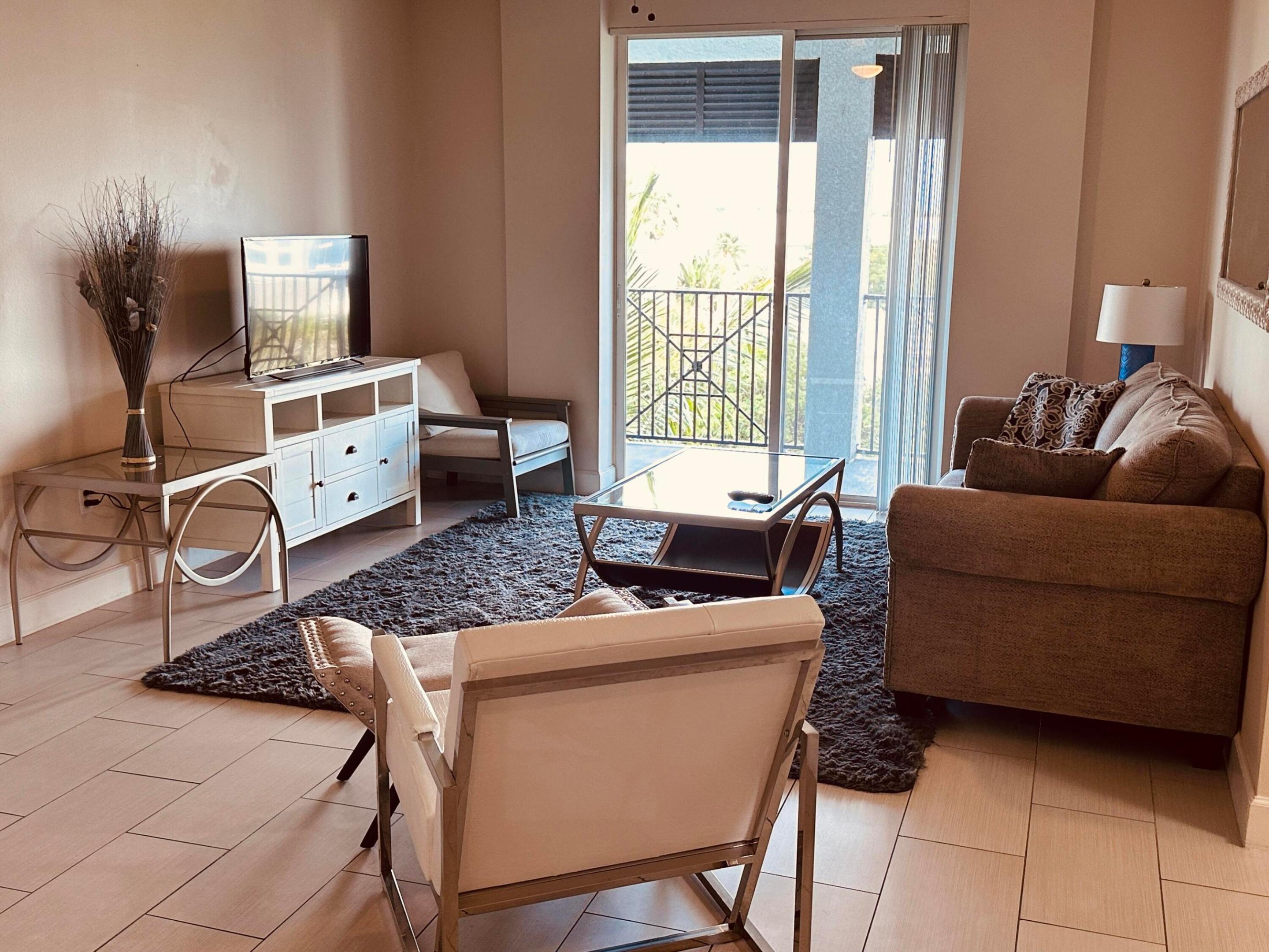 PINEAPPLE GROVE VILLAGE CONDOMINIUM - Residential