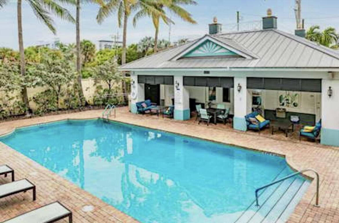 PINEAPPLE GROVE VILLAGE CONDOMINIUM - Residential