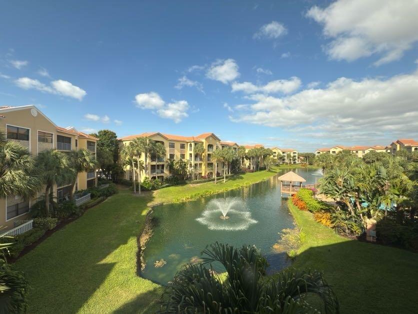 Live the ultimate Florida lifestyle in this beautifully furnished 2-bedroom, 2-bathroom condo located in the heart of Juno Beach. Situated on the top (3rd) floor of a well-maintained, elevator-equipped building, this bright and airy end unit offers stunning panoramic lake views and an abundance of natural light.Enjoy tile flooring throughout, including the screened balcony--perfect for sipping your morning coffee or winding down with a sunset cocktail. The updated kitchen features granite countertops, wood cabinetry, and stainless steel appliances. Both bathrooms are equally upgraded with elegant granite finishes. A full-size new washer and dryer adds to your convenience, and the smart split-bedroom floorplan ensures privacy and comfort.