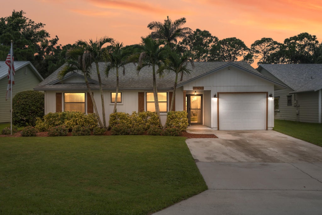 Photo of 6702 SE Raintree Avenue, Stuart, FL 34997 (MLS # B26075522)