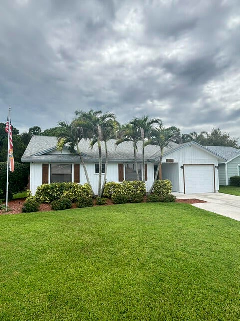 Photo of 6702 SE RAINTREE Avenue, Stuart, FL 34997 (MLS # B26075522)