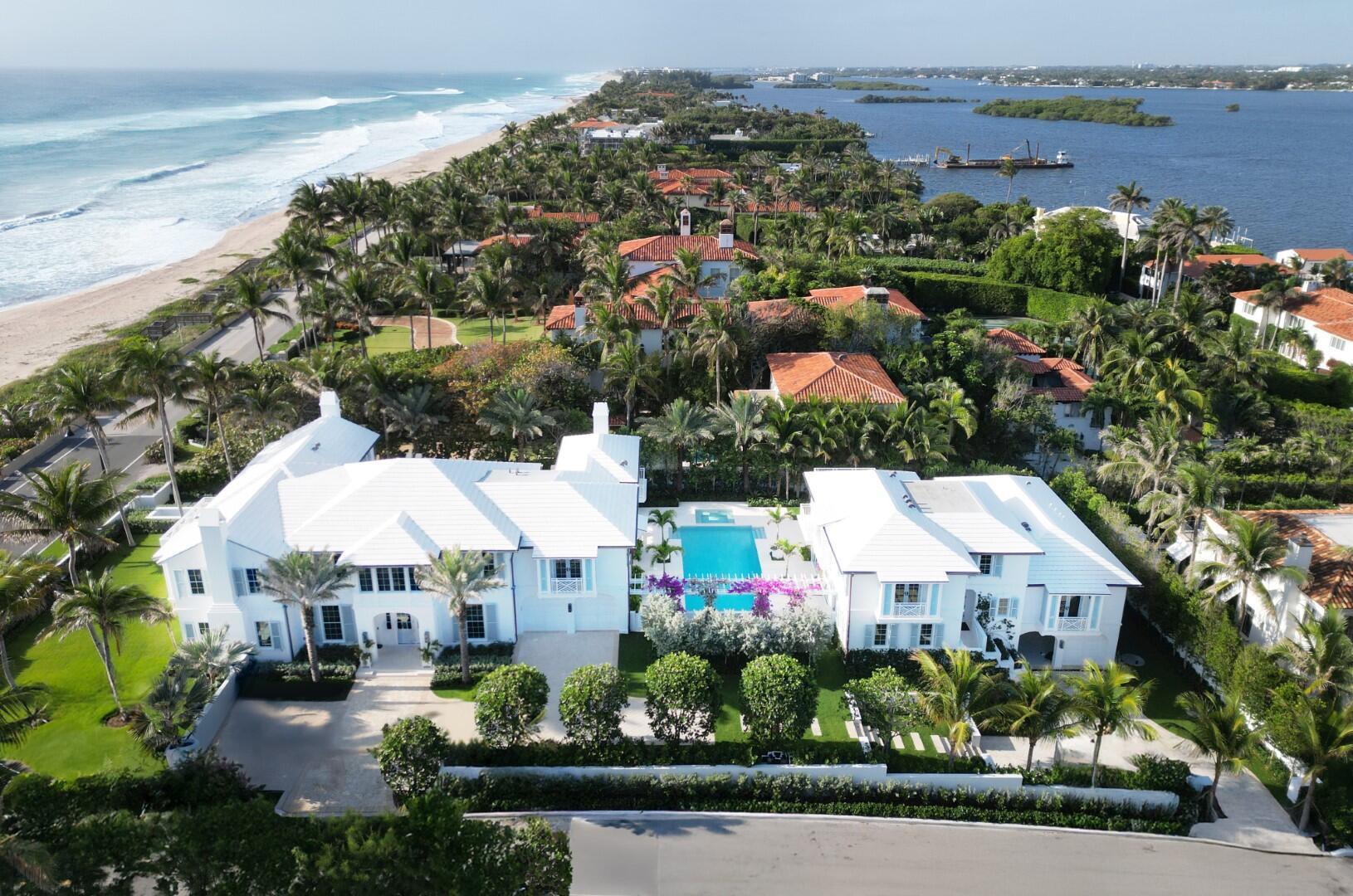 Spectacular New Oceanfront Estate on Billionaires Row - Introducing a newly constructed oceanfront compound on prestigious Billionaires Row, offering panoramic views of the Atlantic Ocean and a refined coastal living experience. This remarkable estate includes a main residence, guest house, and a private tunnel providing direct access to an oceanfront beach cabana. Bermuda-style architecture blends effortlessly with sleek transitional interiors, custom finishes, and curated furnishings throughout the property.Encompassing approximately 16,500+/- total square feet on .98+/- acres, the estate has 8 bedrooms, 12 full bathrooms, and 3 half baths. The main house features 5 bedrooms, 7 full bathrooms, 2 half bathrooms, 1 cabana bathroom, and a two-car garage. The guest house includes