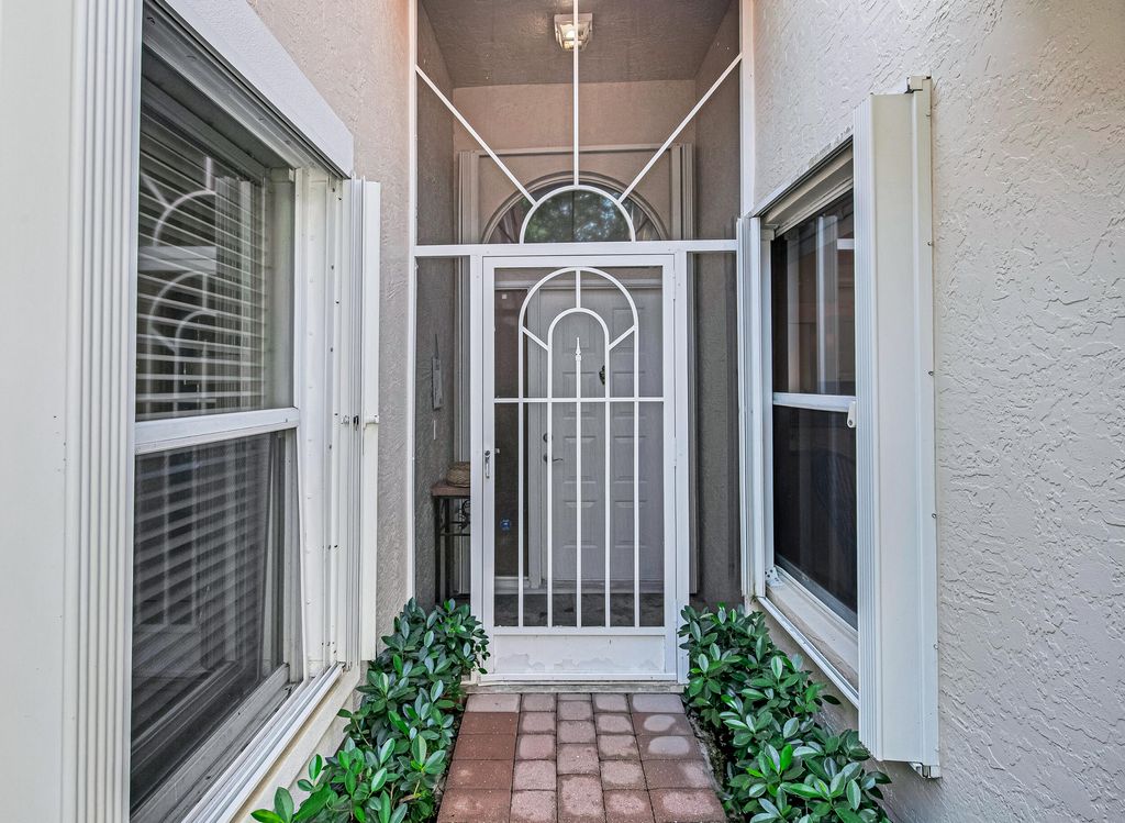 Photo of 7690 Majestic Palm Drive, Boynton Beach, FL 33437 (MLS # B26010117)