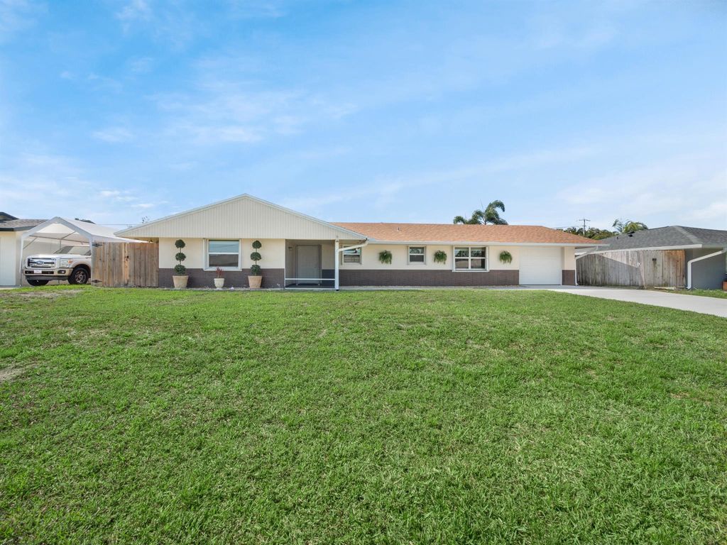 Photo of 1964 SW Capri Street, Palm City, FL 34990 (MLS # R10879718)
