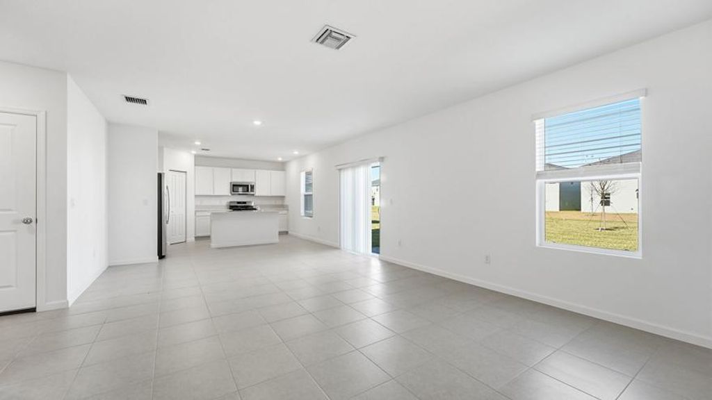 Photo of 10761 NW Everbreeze Drive, Port Saint Lucie, FL 34987 (MLS # R11159378)