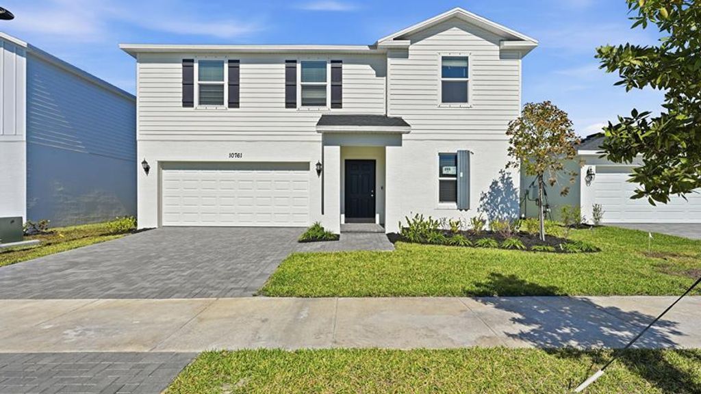 Photo of 10761 NW Everbreeze Drive, Port Saint Lucie, FL 34987 (MLS # R11159378)