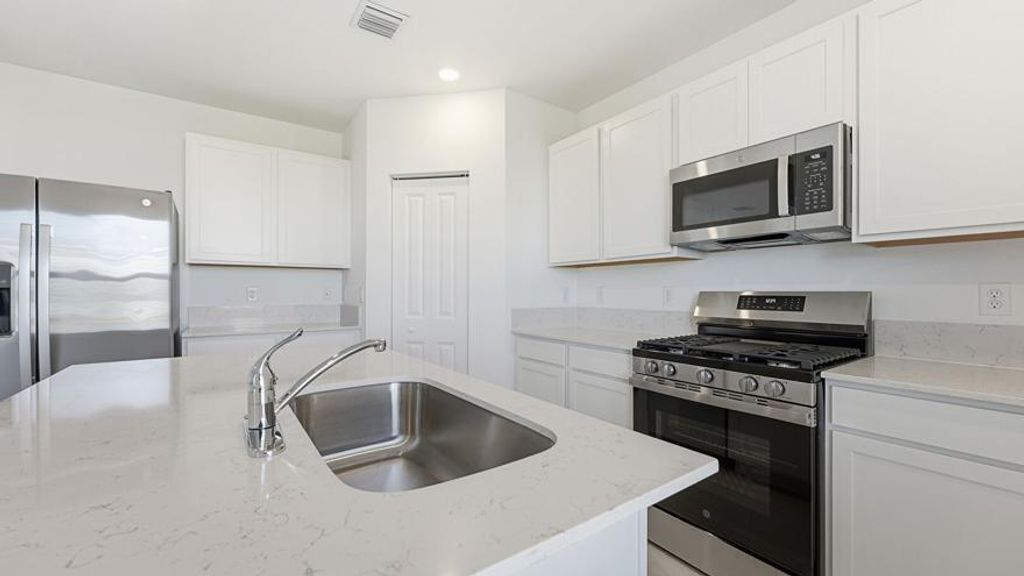 Photo of 10761 NW Everbreeze Drive, Port Saint Lucie, FL 34987 (MLS # R11159378)