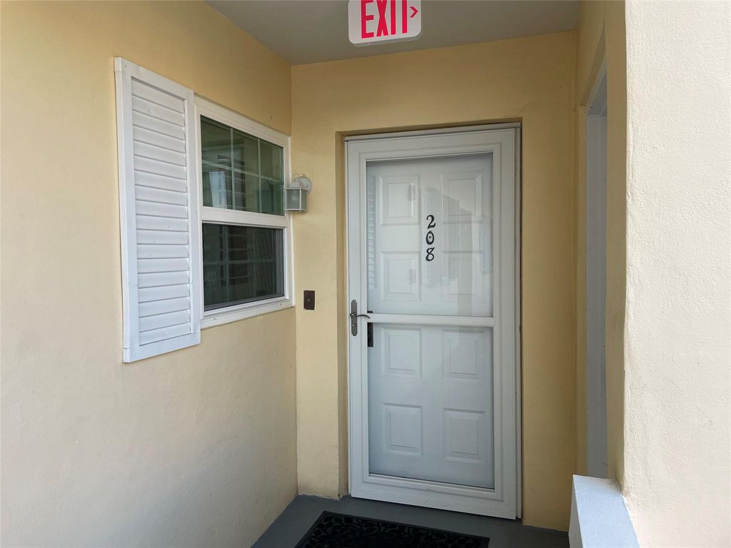 Photo of 250 John F Kennedy Drive #208, Atlantis, FL 33462 (MLS # F10427702)