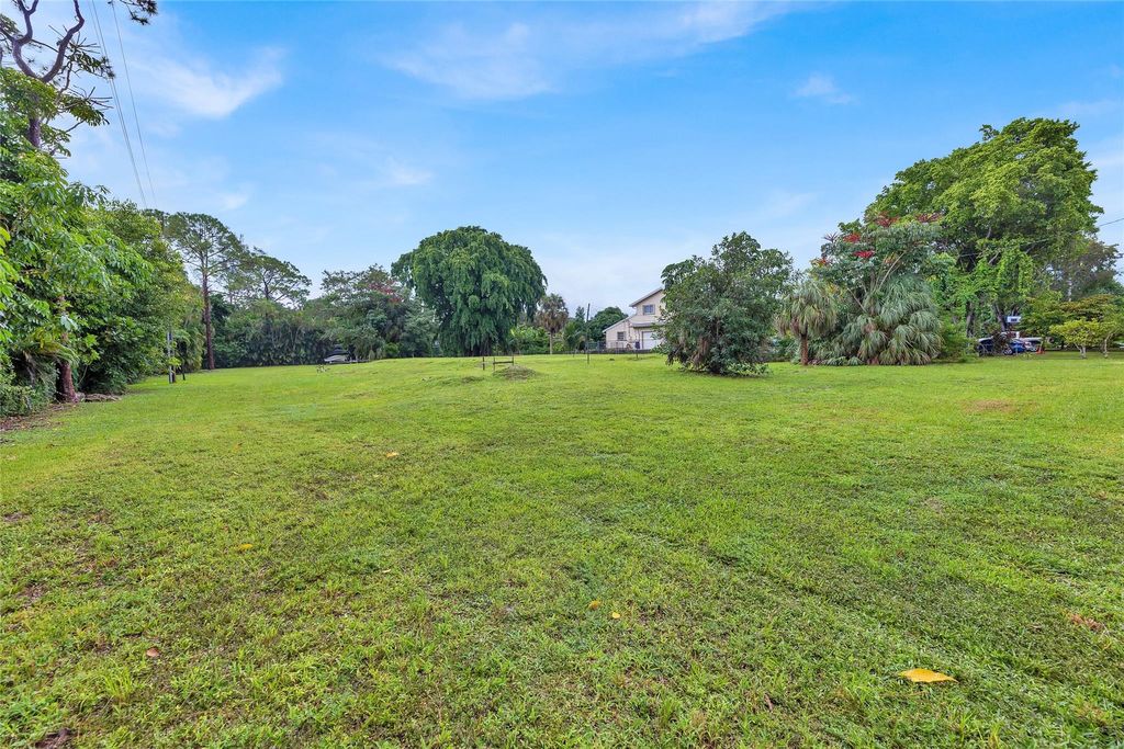 Photo of 7450 Lyons Road, Pompano Beach, FL 33073 (MLS # F10487716)