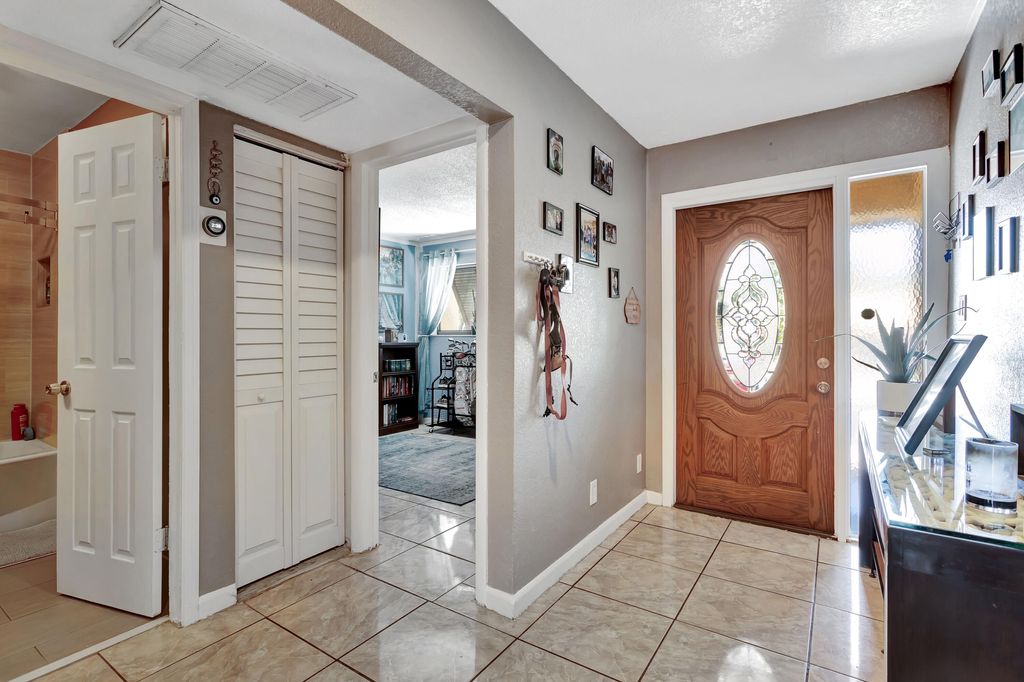 Photo of 220 NW 43rd Street, Deerfield Beach, FL 33064 (MLS # R11082034)