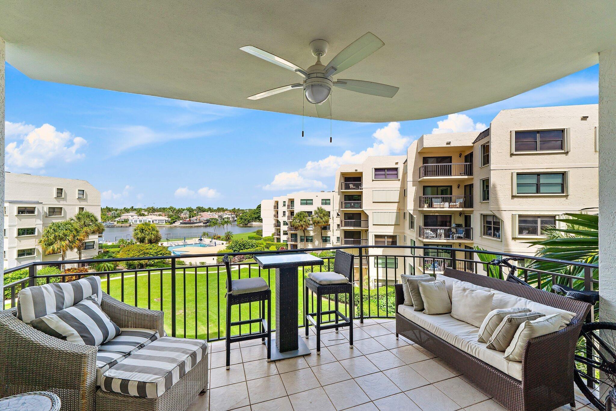 Experience elevated coastal living in this impeccably renovated waterfront residence at Seamark, North Palm Beach. Redesigned in 2020 with the finest finishes, this 2-bedroom, 2-bath condo exudes modern elegance and timeless style. Every detail has been thoughtfully curated, from the sleek tile flooring and smooth ceilings to the impact windows & doors, new A/C, water heater, and premium appliance package. The chef's kitchen is a showpiece, featuring Calcite countertops, natural stone sinks, oversized cabinetry, a custom vent hood, 36'' induction cooktop, double oven, wine cooler, and built-in coffee bar, perfectly blending function with sophistication. Both bathrooms are equally impressive, with quartz counters, upgraded toilets, and an oversized marble shower that adds a spa-like