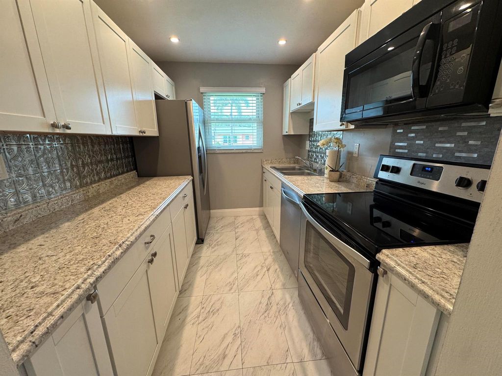 Photo of 250 N High Point Boulevard #B, Boynton Beach, FL 33435 (MLS # R11097891)