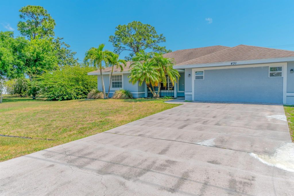 Photo of 431 NW Ravenswood Lane, Port Saint Lucie, FL 34983 (MLS # R11017645)
