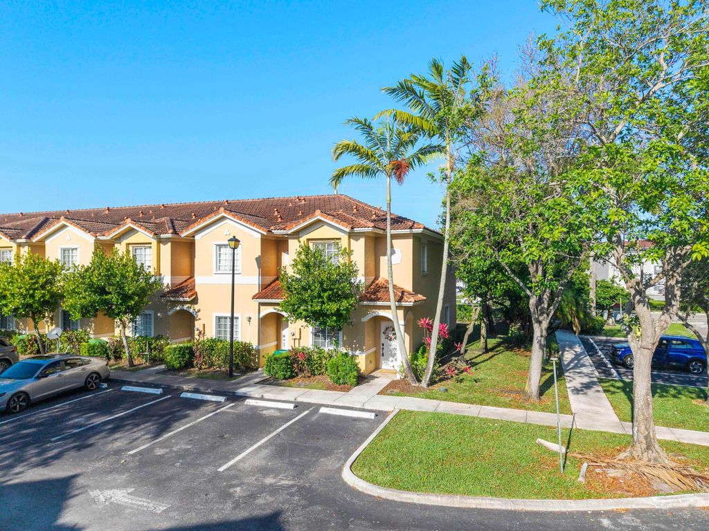 Photo of 5910 Riverside Avenue, Tamarac, FL 33321 (MLS # B26026896)