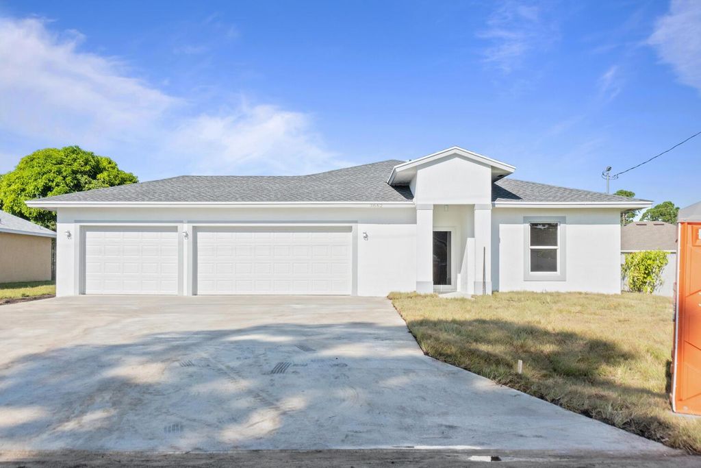 Photo of 3662 SW Ballweg Street, Port St Lucie, FL 34953 (MLS # R10917243)