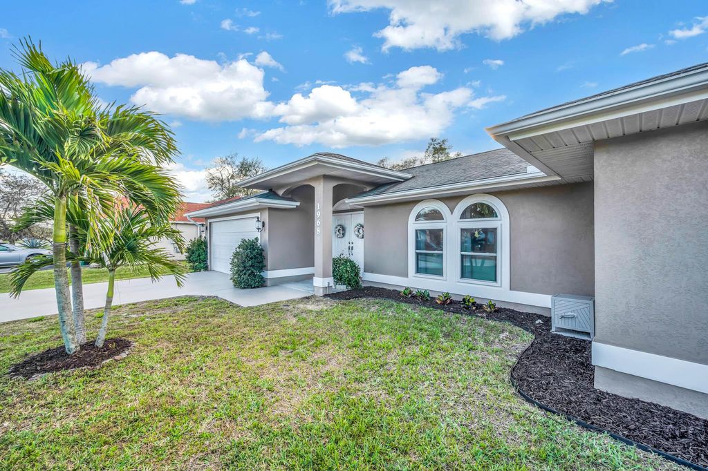 Photo of 1968 SW Capeador Street, Port Saint Lucie, FL 34953 (MLS # R10961763)