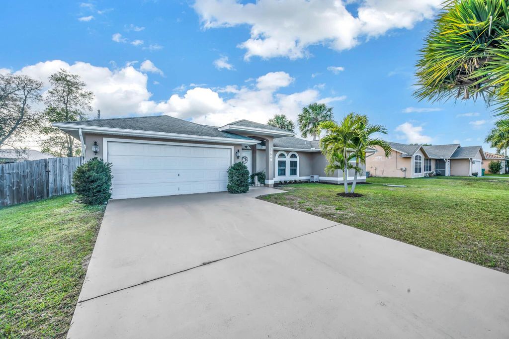 Photo of 1968 SW Capeador Street, Port Saint Lucie, FL 34953 (MLS # R10961763)