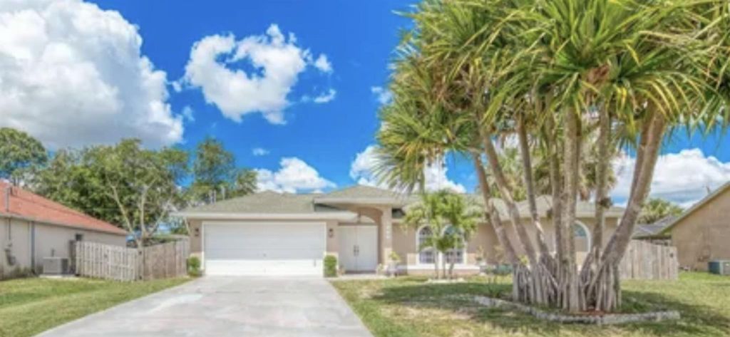 Photo of 1968 SW Capeador Street, Port Saint Lucie, FL 34953 (MLS # R10961763)