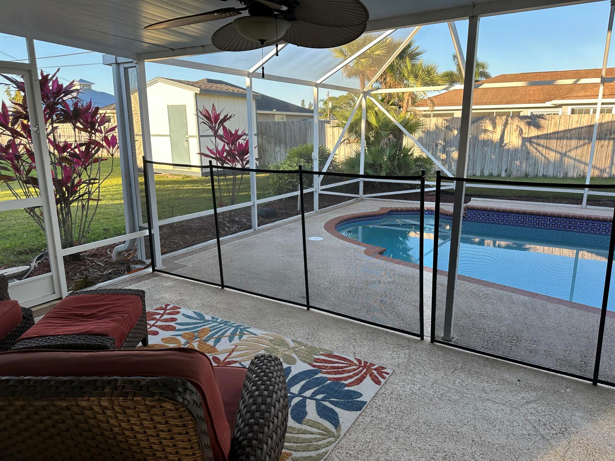 LOCATION, LOCATION, LOCATION! Looking for a home without an HOA Fee in the highly sought after area of section 35-backs up to Tradition, 3-5 min to Publix, Tradition shopping, & I-95. Home offers a 2023 roof, tiled floors throughout, new white kitchen cabinets with soft close doors-2023, quartz countertops & backsplash-2023, pantry w/ pull out shelving-, vaulted ceilings, freshly painted interior, french doors lead to the 36' X 15' screen enclosed pool (newer screens replaced-2023 w/interior pool cage painted, resurfaced pool in 2016. Mature landscaping w/A well irrigation system-new irrigation pump-2023, new plywood in the attic of the garage-2023-tons of storage-plus shed, epoxied garage floors, painted exterior in 2023, A/C 2016/2017. H/W heater-2020. MORE PHOTO'S & VIDEO COMING SOON!