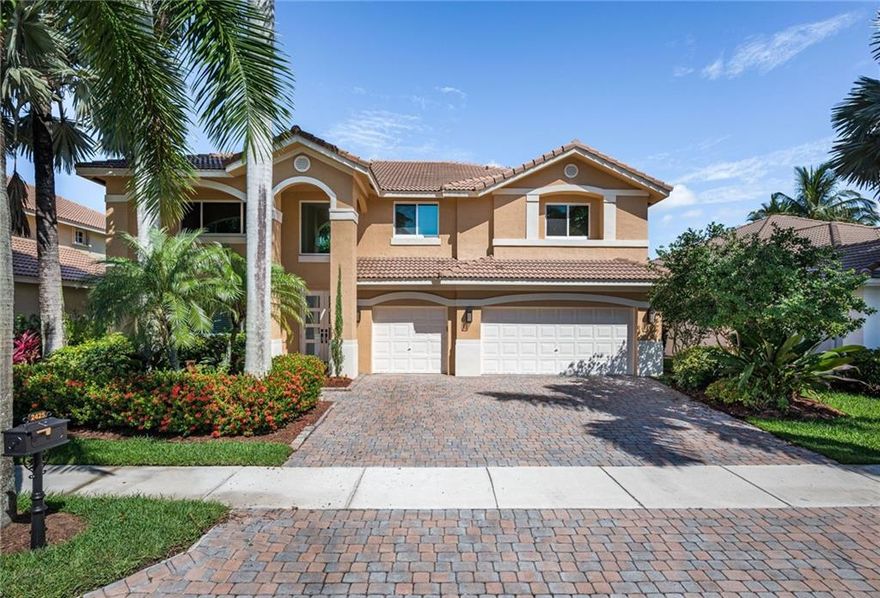 BEAUTIFUL HOME IN WESTON HILLS COUNTRY CLUB.PLENTY OF NATURAL LIGHT AND OPEN SPACE,HURRICANE IMPACT DOOR AS WELL AS MOST WINDOWS. FEATURING 5 BEDROOMS AND 4 BATHROOMS . PLUS DEN/OFFICE ON FIRST FLOOR. MARBLE FLOORS ON FIRST FLOOR AND 14MM WATERPROOF LAMINATE ON STAIRCASE AND THROUGHOUT SECOND FLOOR. ALL BEDROOMS HAVE WALK IN CLOSETS.MASTER BEDROOM WITH STUDIO/GYM SEPARATE SPACE.  GREAT OUTDOOR AREA WITH GENEROUS COVERED AND SCREENED PORCH WITH AN OVERSIZED HEATED POOL WITH SPA. SPACIOUS KITCHEN WITH SS APPLIANCES AND GRANITE COUNTERTOPS. LARGE FAMILY ROOM WITH VIEWS OF THE POOL AND GARDEN. THREE CAR GARAGE. PAVED DRIVEWAY AND LUSCIOUS LANDSCAPING IN FRONT AND BACK YARDS. SHORT WALK TO PARK (SOCCER FIELD, BASKETBALL COURT, PLAYGORUND) A+ SCHOOLS. PLEASE SEE ATTACHMENTS FOR HOA INFORMATION AND SELLER'S DISCLOSURE