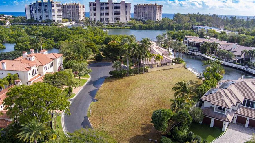 The Sanctuary Deepwater Lot Opportunity sited on 24,936± sq. ft with 102± feet of waterfrontage facing South. Perfect time to build your dream estate in Boca Raton's most exclusive yachting enclave with 24-hour guard gate, road patrol, and waterway patrol for maximum security. See proposed front elevation and floor plans by award winning Affiniti Architects.